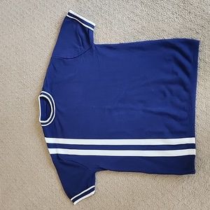 Short sleeved sweater style cotton shirt. Size M. Good Condition.